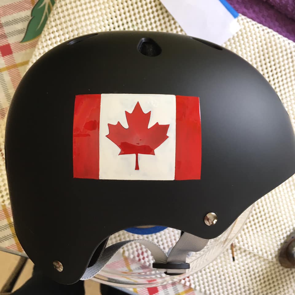 Pinstripes by Julie Fournier on Helmet with painted Canadian Flag
