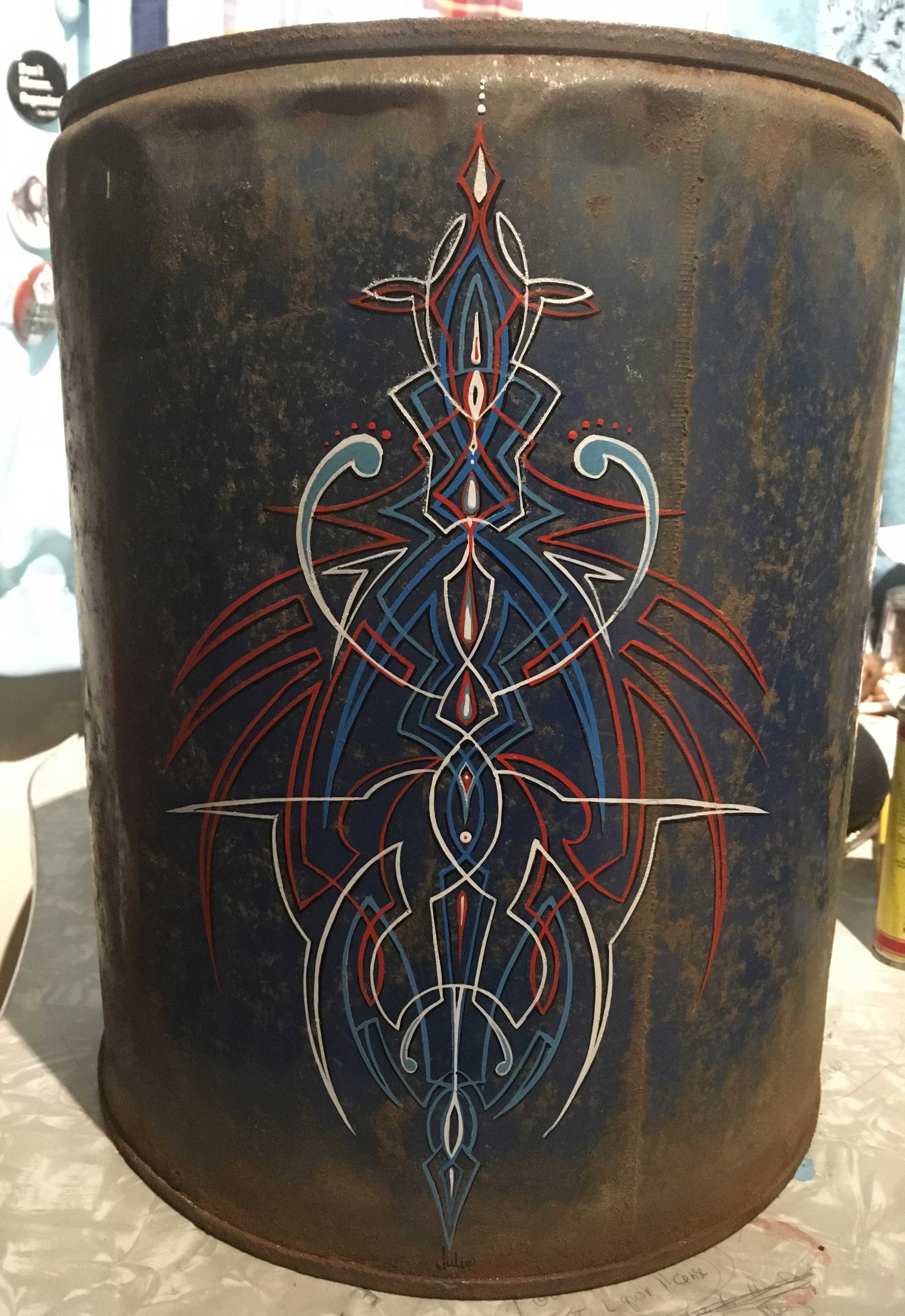Pinstriped antique gas can by Julie Fournier